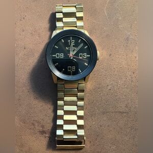 Nixon men’s Private Stainless Steel gold watch